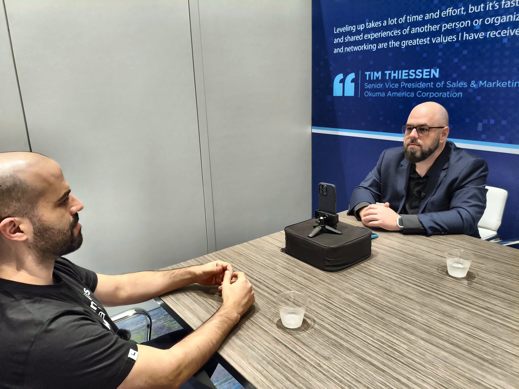 David Priev, CEO of Limitless Labs, recording a podcast with James Marzilli at IMTS 2026