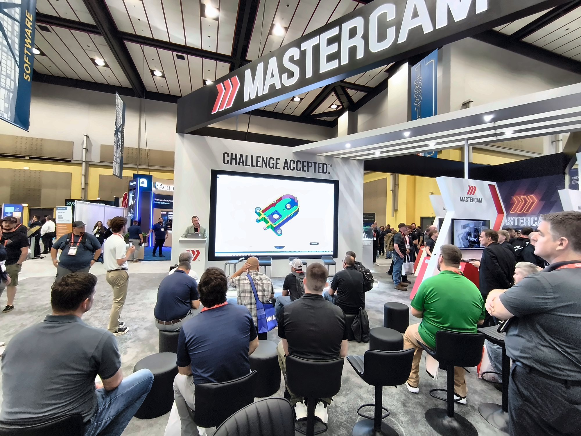Dor Kopito, VP Product at Limitless Labs, running a live AI CAM software demo at the Mastercam booth at IMTS 2026